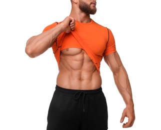 Photo of Young bodybuilder showing his muscular body on white background, closeup