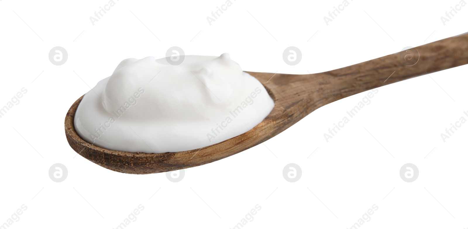 Photo of Delicious natural yogurt in spoon isolated on white