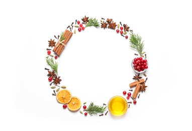 Photo of Frame of mulled wine ingredients on white background, top view. Space for text