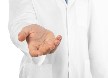 Photo of Male doctor offering helping hand on white background, closeup