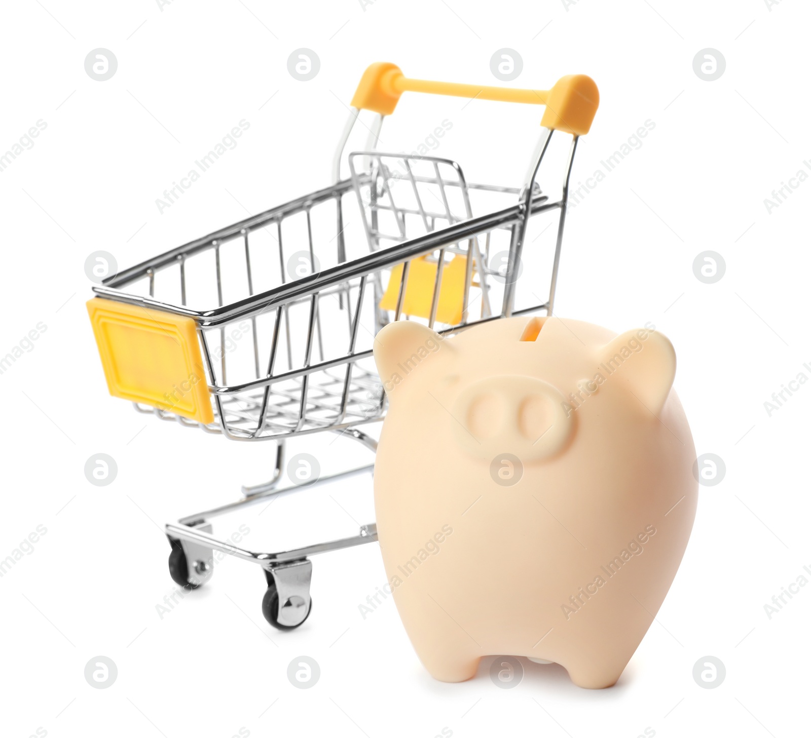 Photo of Piggy bank with shopping cart isolated on white