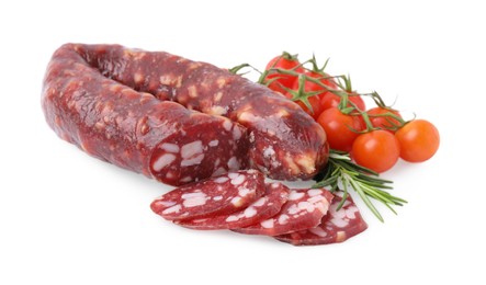 Photo of Delicious cut smoked sausage, tomatoes and rosemary isolated on white