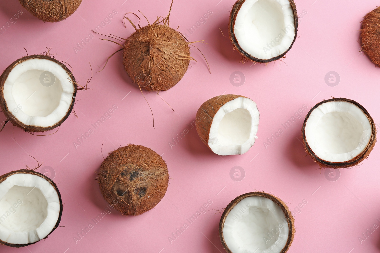 Photo of Coconut pattern on color background, flat lay