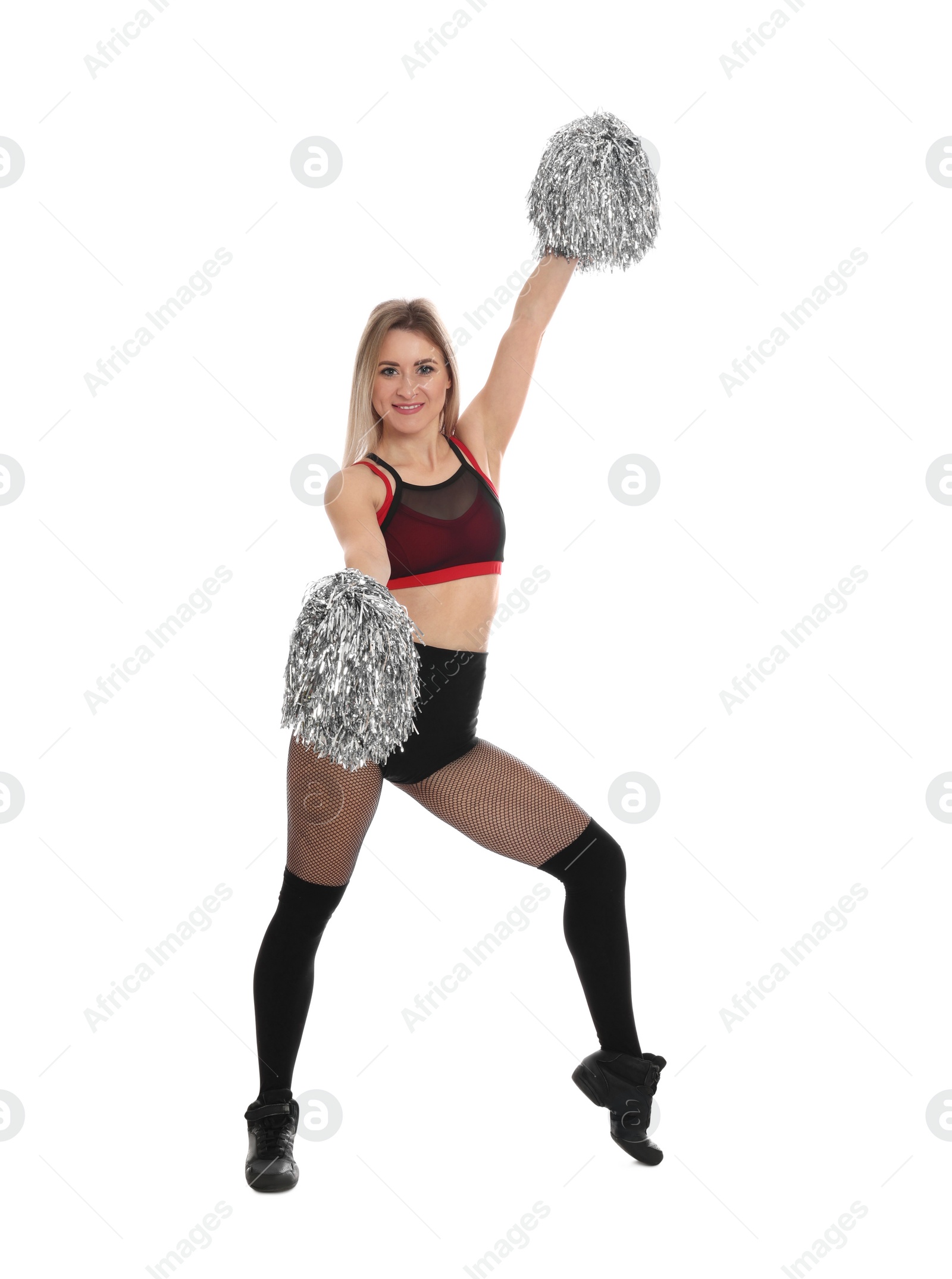 Photo of Beautiful cheerleader in costume holding pom poms on white background