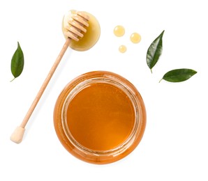 Photo of Tasty honey in glass jar, dipper and leaves isolated on white, top view