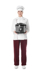 Photo of Full length portrait of female chef with modern multi cooker on white background