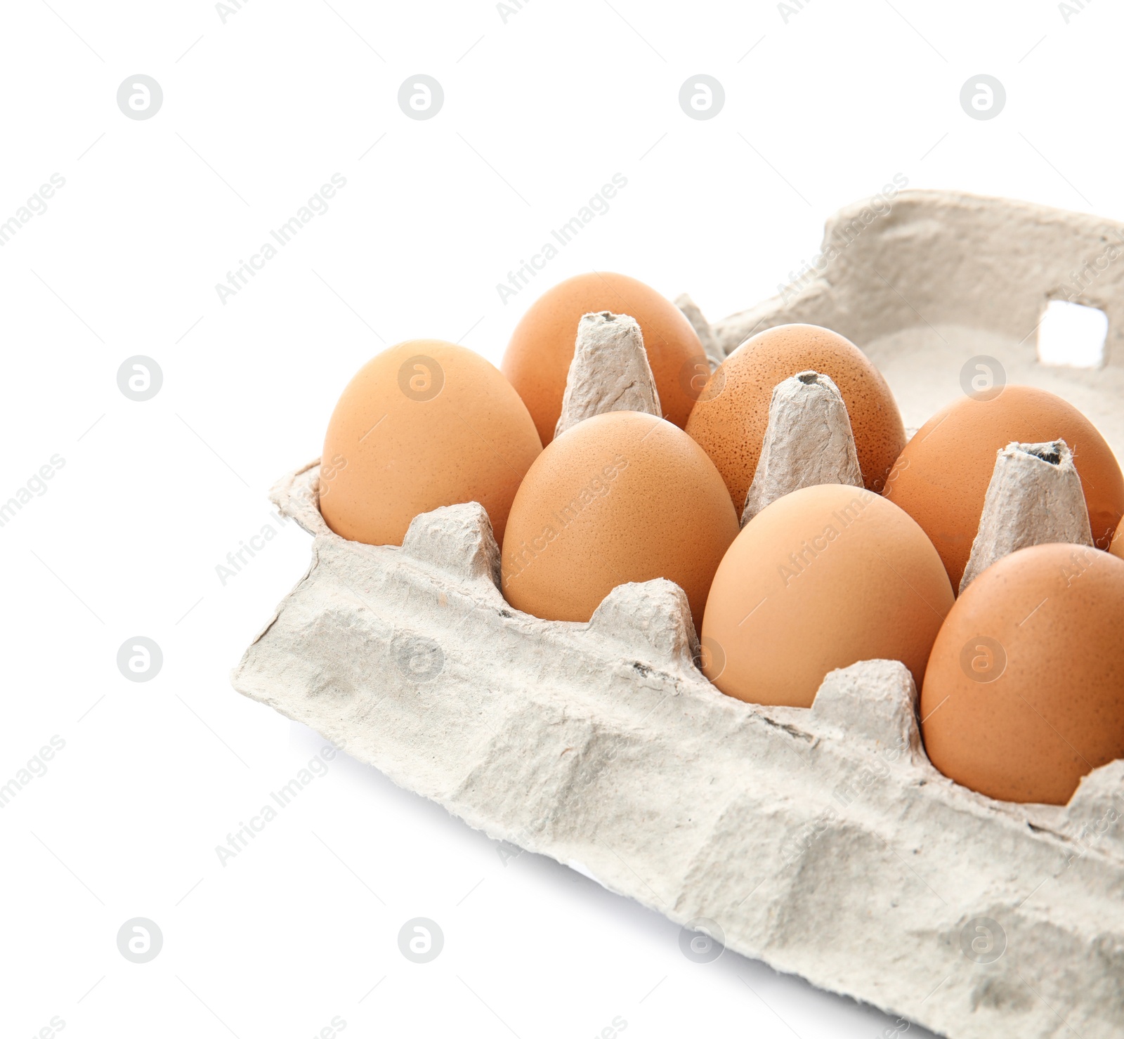 Photo of Carton of raw chicken eggs on white background