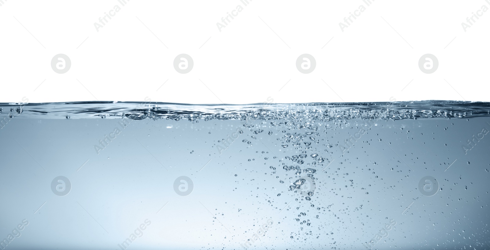 Photo of Bubbles in clear water on grey background