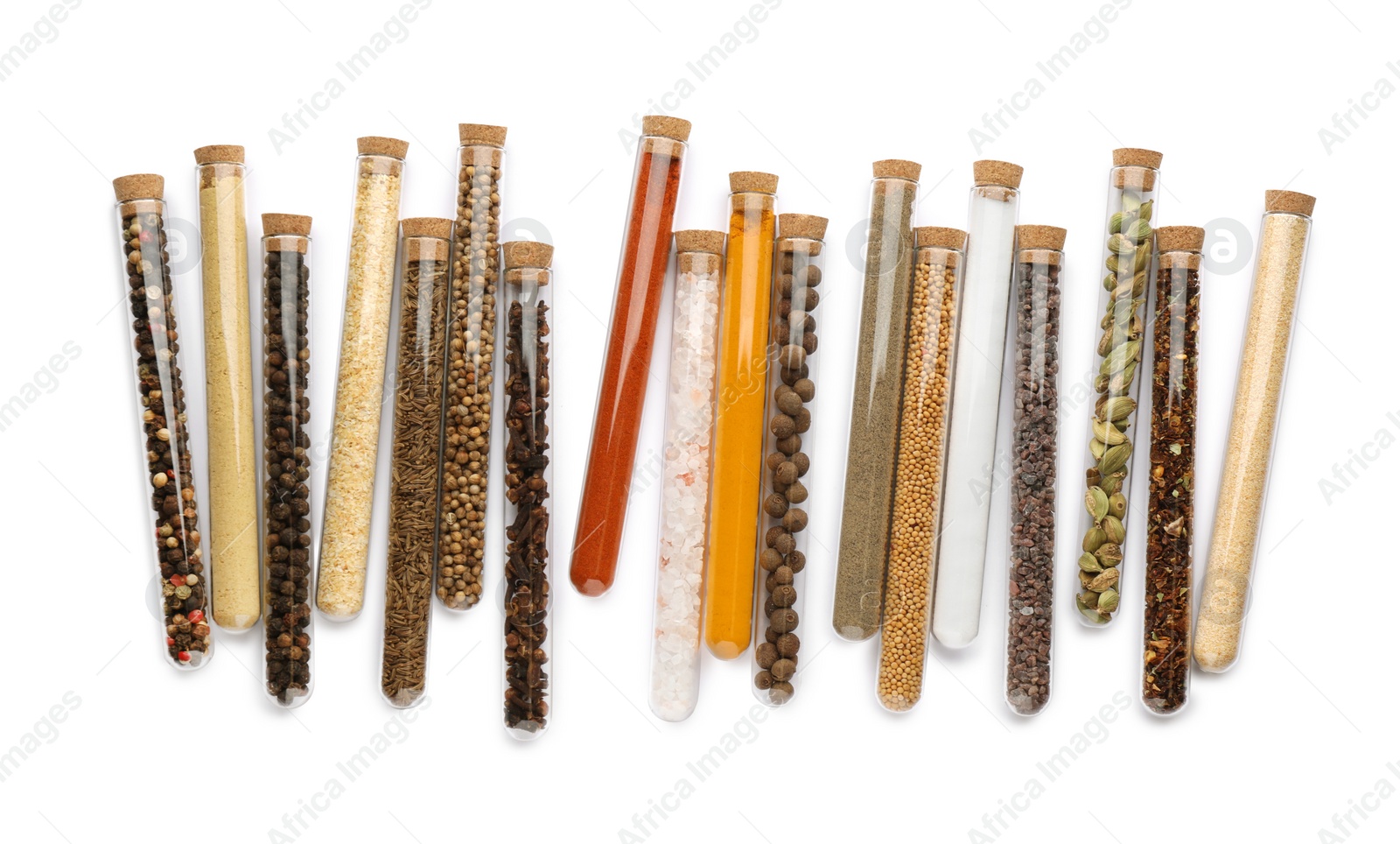 Photo of Glass tubes with different spices on white background, top view