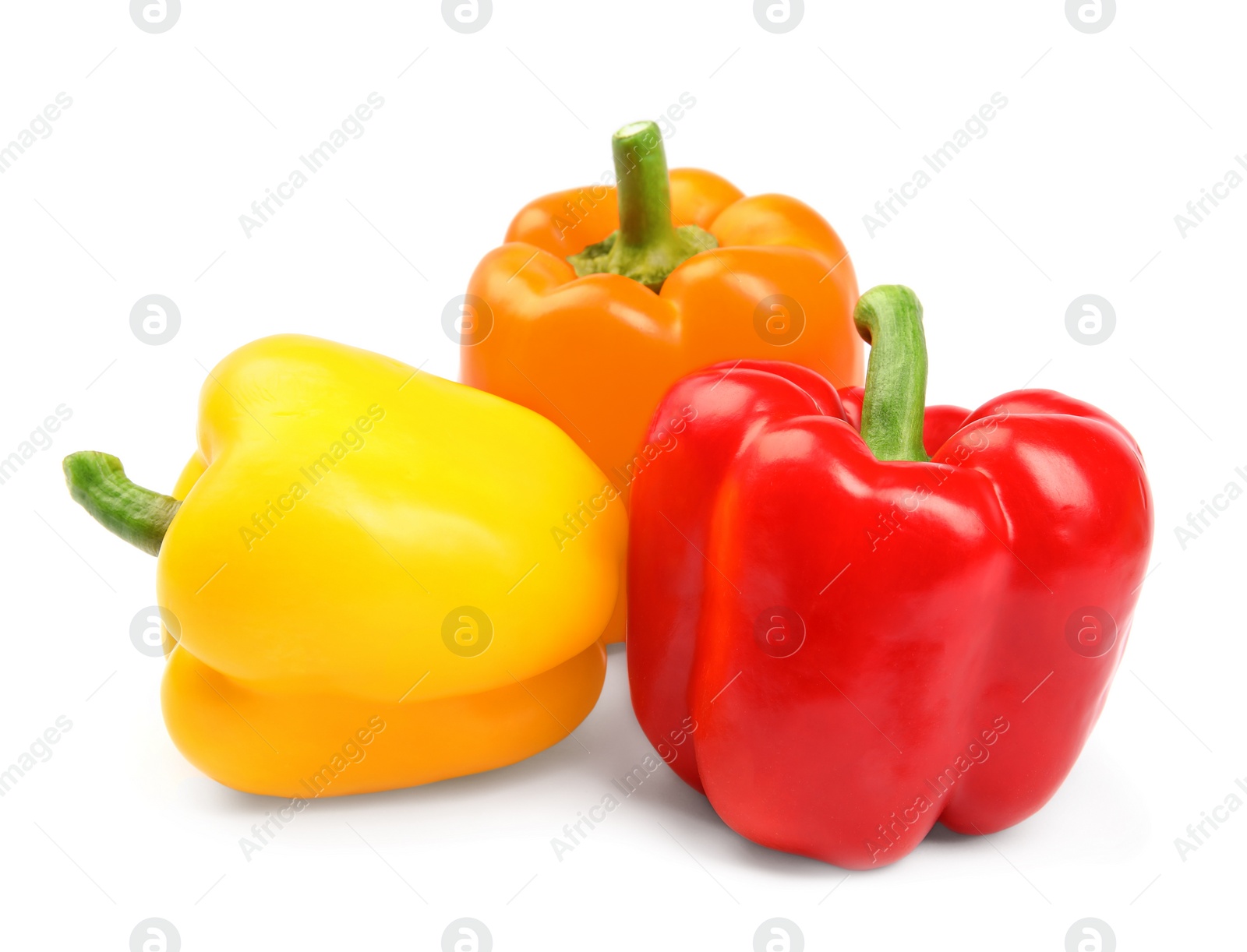 Photo of Fresh ripe bell peppers on white background