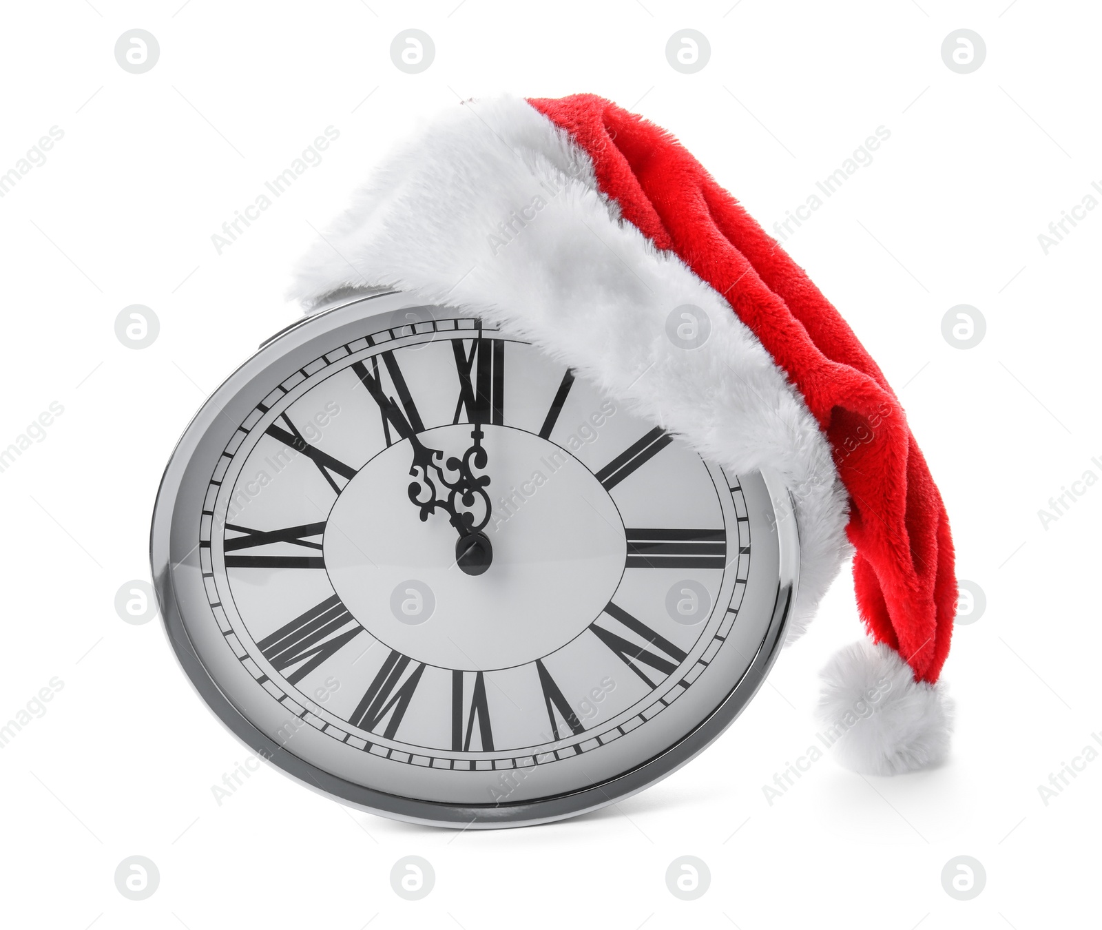 Photo of Clock with Santa hat on white background. Christmas countdown