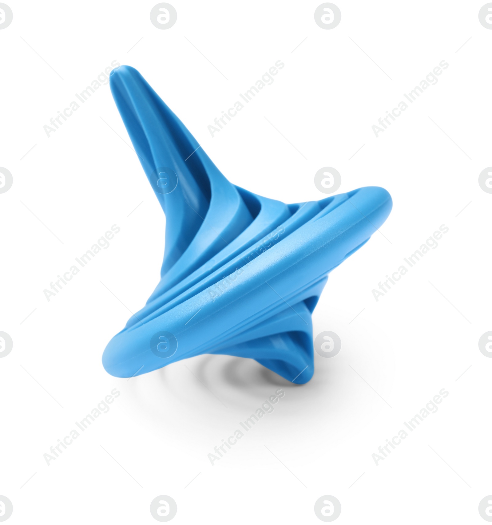 Photo of One blue spinning top isolated on white