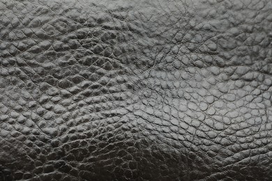 Texture of black leather as background, closeup