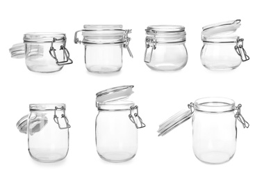 Image of Set with different empty glass jars on white background