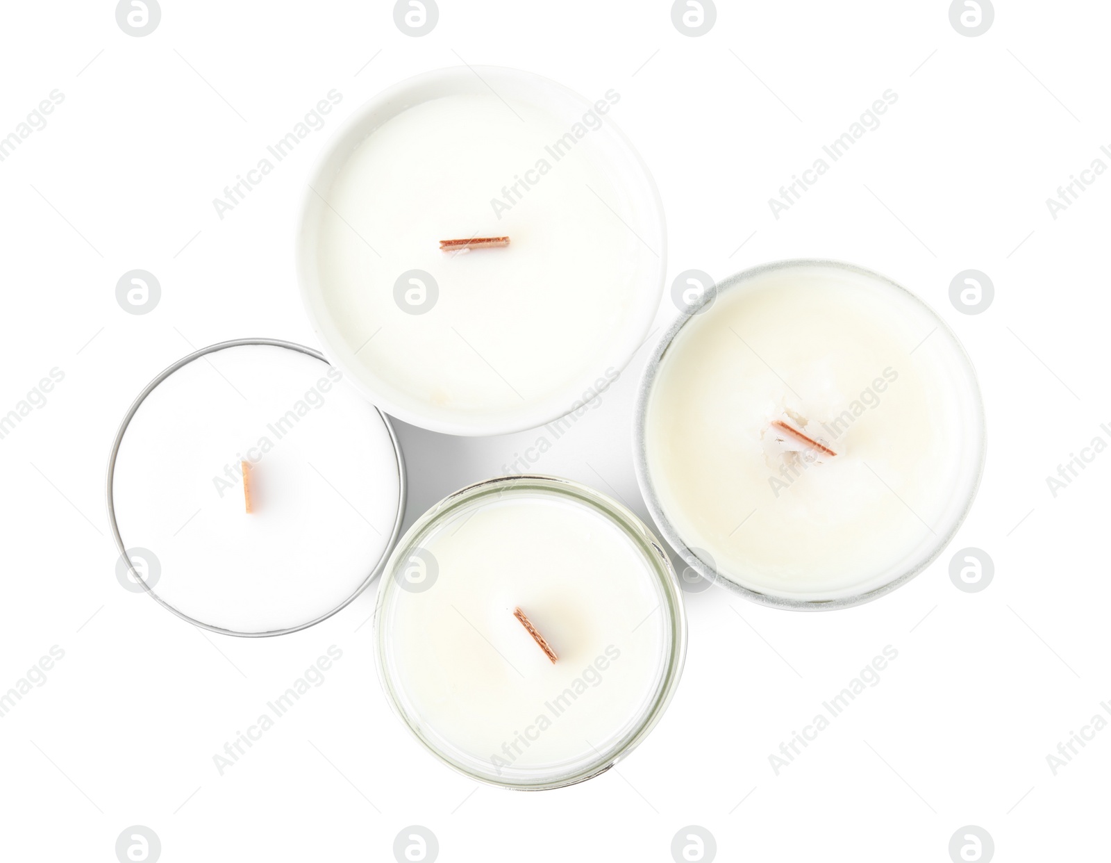 Photo of Beautiful candles with wooden wicks on white background, top view