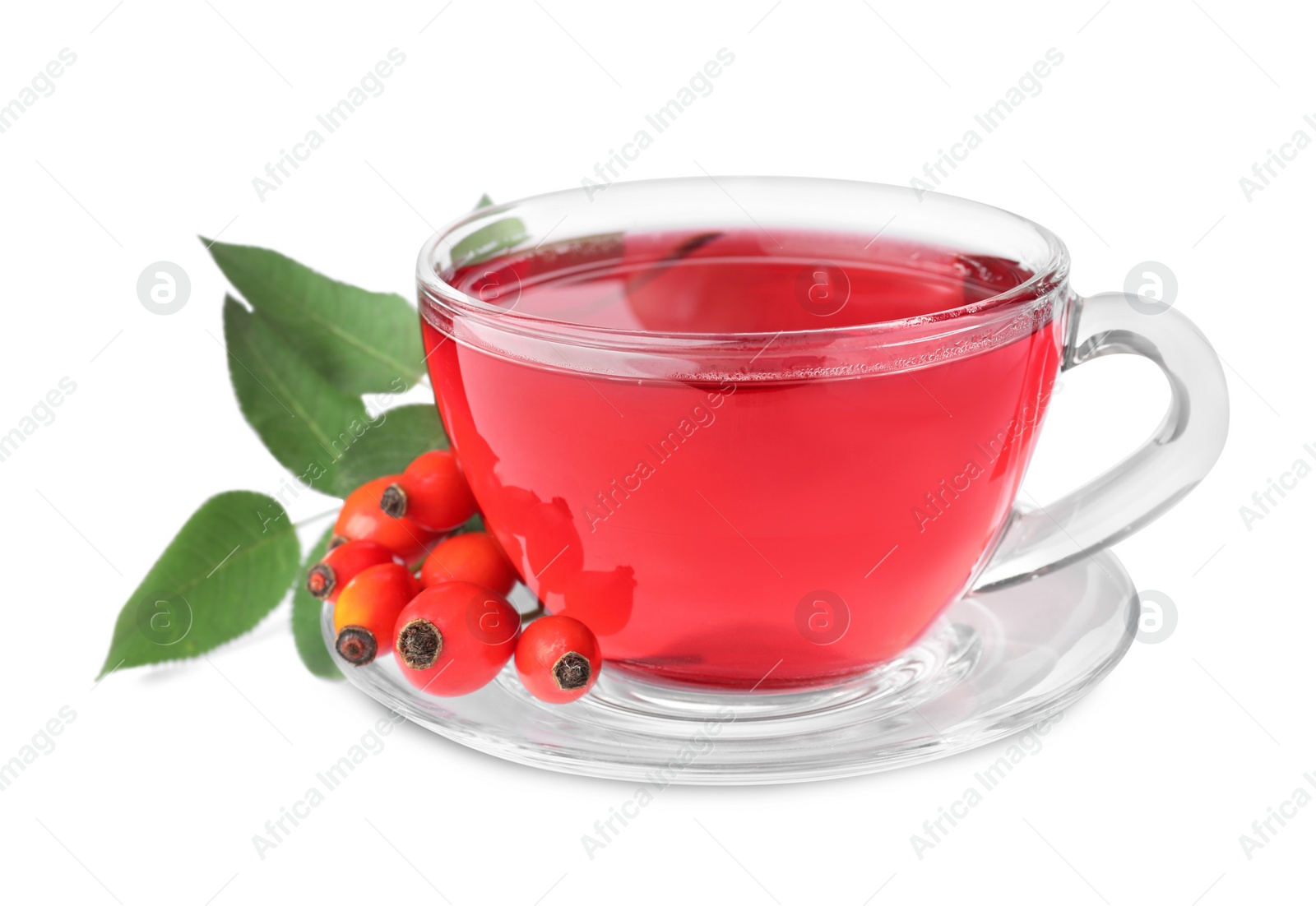 Photo of Aromatic rose hip tea and fresh berries on white background