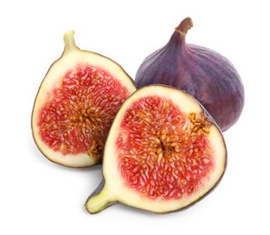 Photo of Whole and cut fresh ripe figs isolated on white