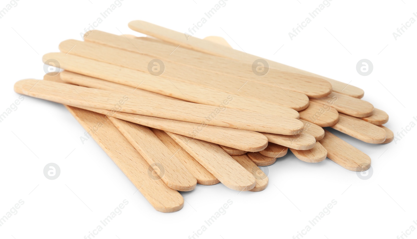 Photo of Disposable wooden spatulas for depilatory wax on white background