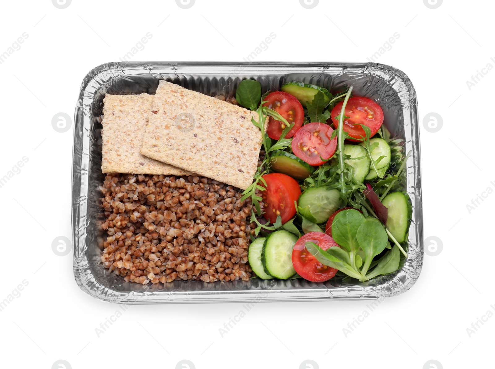 Photo of Container with buckwheat, fresh salad and crispbreads isolated on white, top view