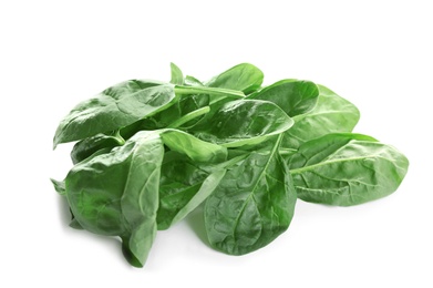 Heap of fresh green healthy baby spinach leaves isolated on white