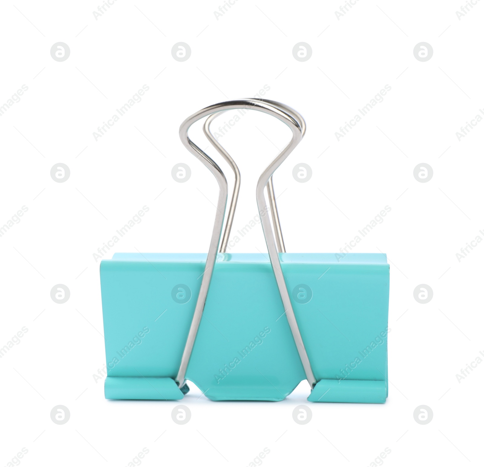 Photo of Turquoise binder clip isolated on white. Stationery