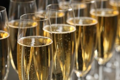 Many glasses of champagne, closeup. Festive drink