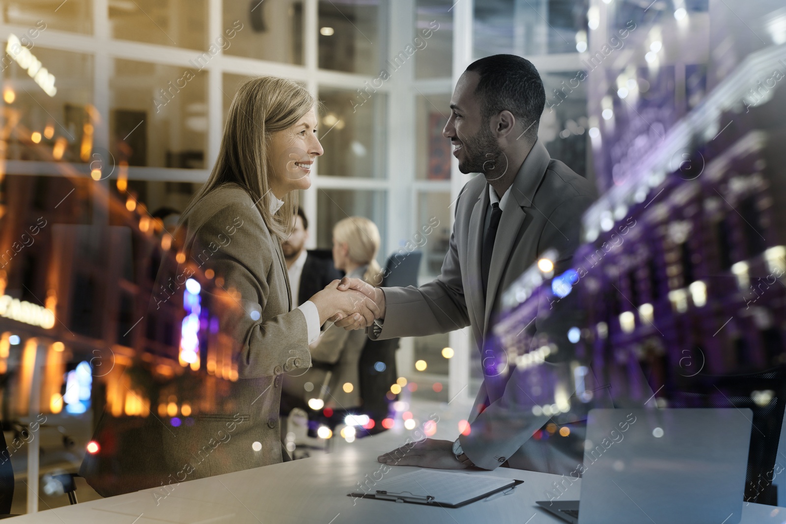 Image of Double exposure of business team in office and cityscape