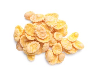 Photo of Heap of tasty crispy corn flakes isolated on white, top view