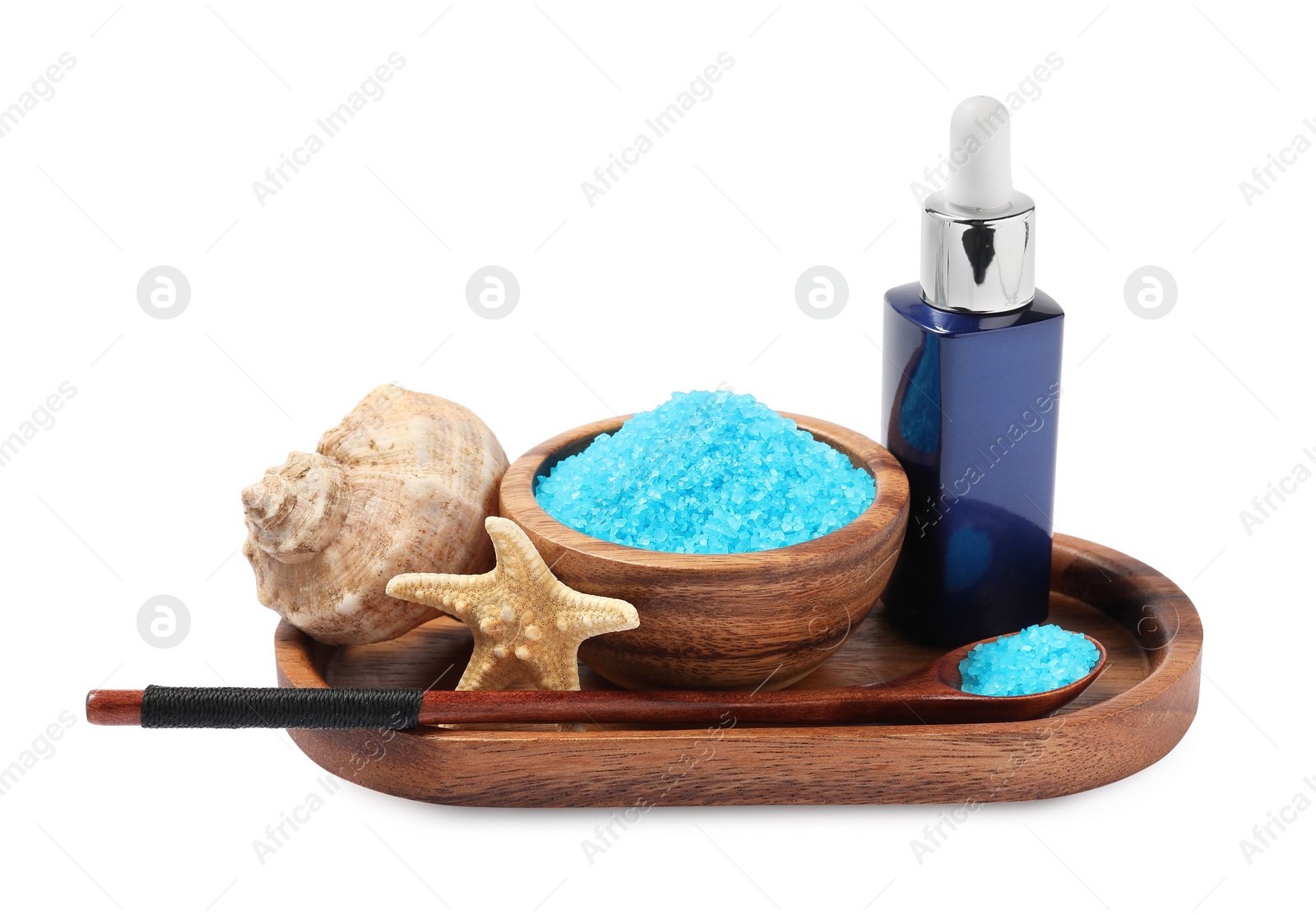 Photo of Light blue sea salt in bowl, shell, starfish and cosmetic product isolated on white