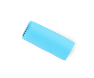 Photo of Light blue chewy candy with liquorice isolated on white, top view
