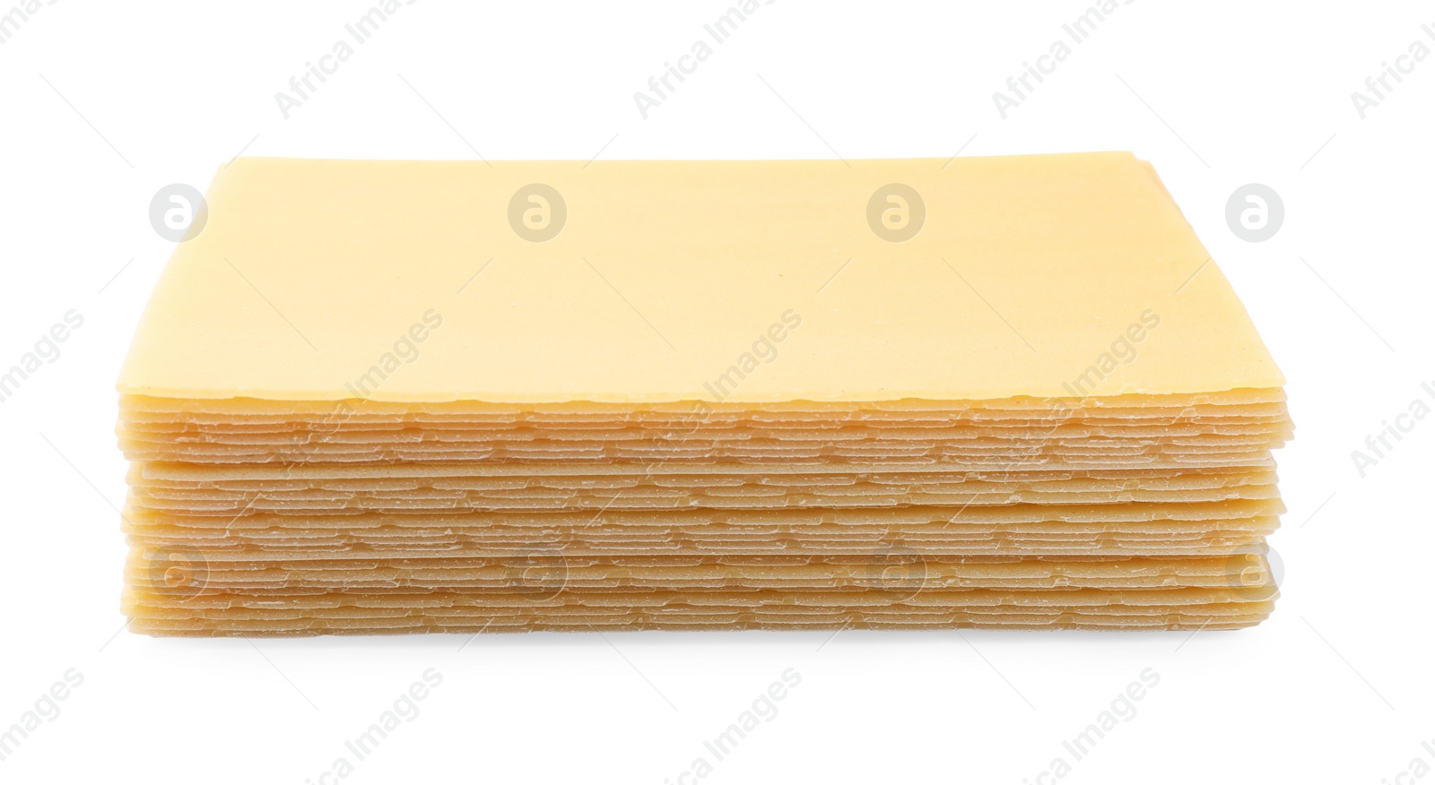 Photo of Stack of uncooked lasagna sheets isolated on white