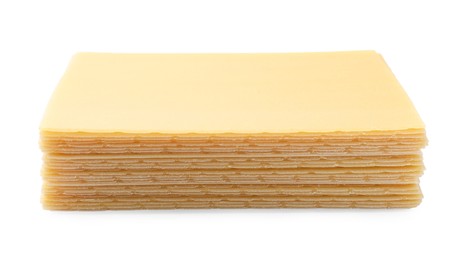 Stack of uncooked lasagna sheets isolated on white