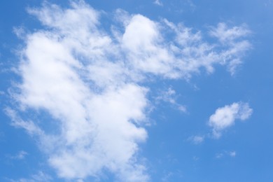 Photo of Beautiful blue sky with fluffy clouds, low angle view