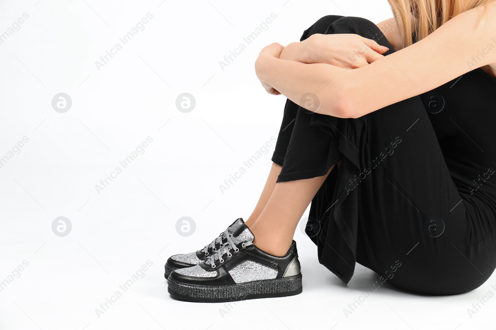 Photo of Woman in stylish shoes on white background, closeup