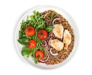 Photo of Tasty buckwheat porridge with meat and vegetables on white background, top view