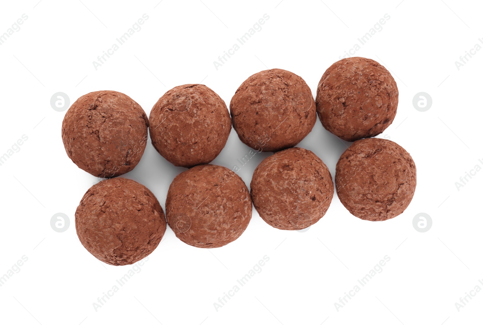 Photo of Tasty sweet chocolate candies isolated on white, top view