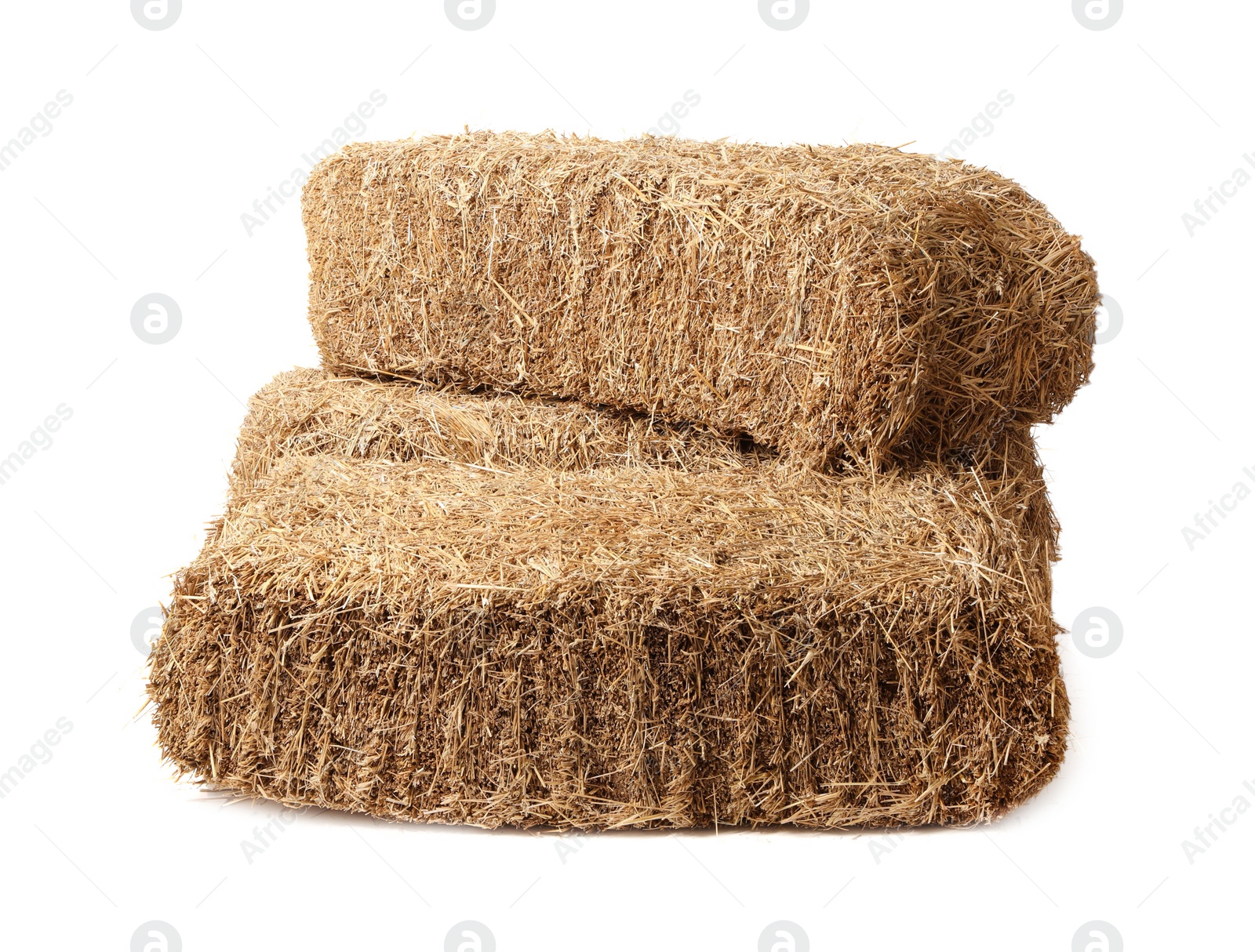 Photo of Bales of dried straw isolated on white