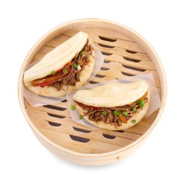 Photo of Delicious gua bao in bamboo steamer isolated on white, top view