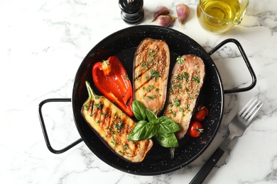 Photo of Flat lay composition with grill pan of fried eggplants on marble table