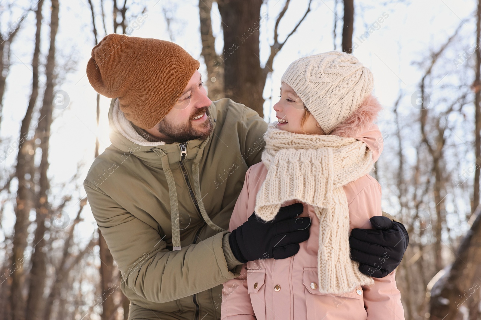 Photo of Family time. Happy father and his daughter in forest