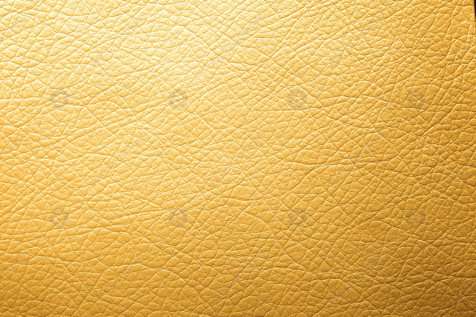 Image of Golden textured surface as background, closeup view