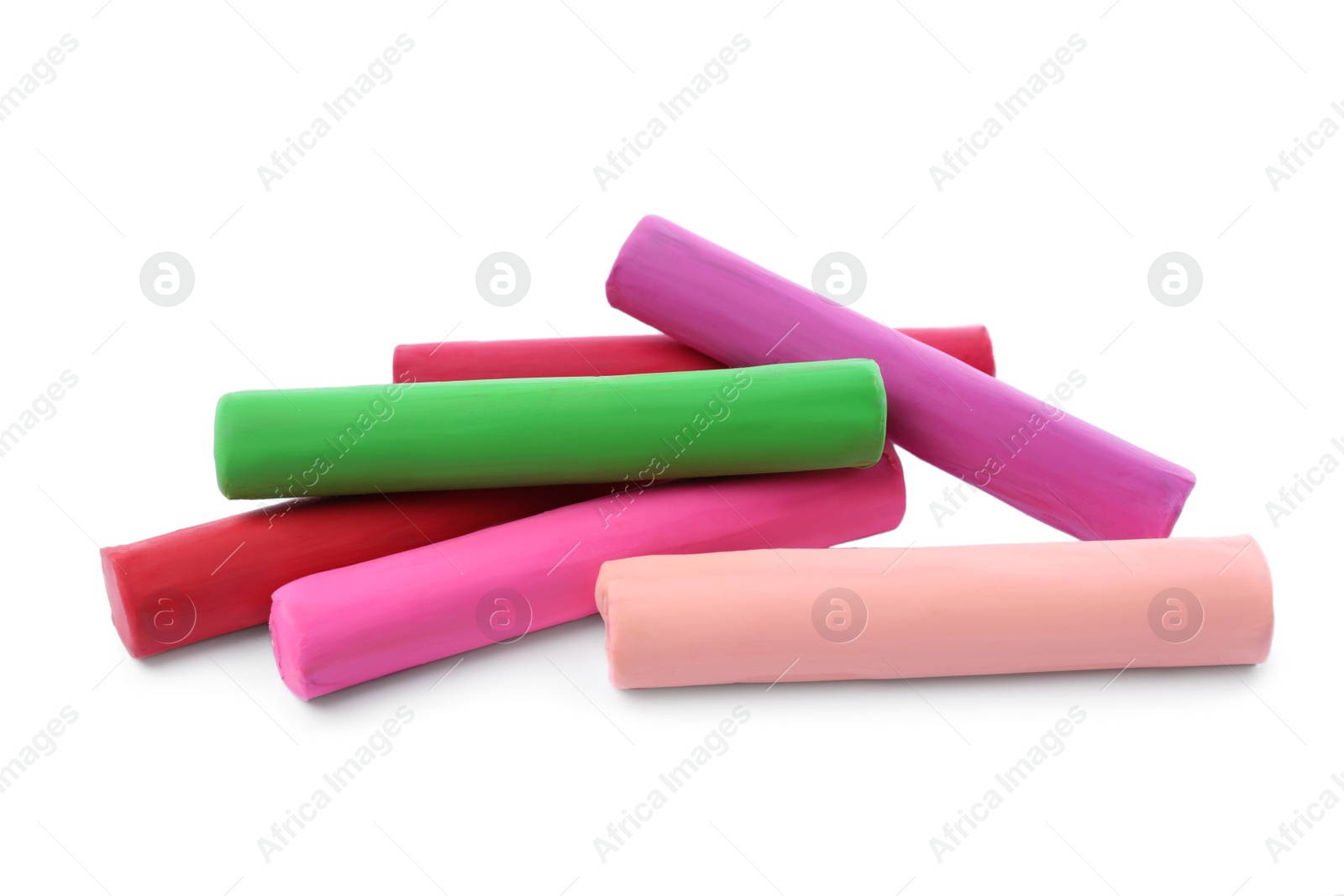 Photo of Many different colorful plasticine pieces on white background