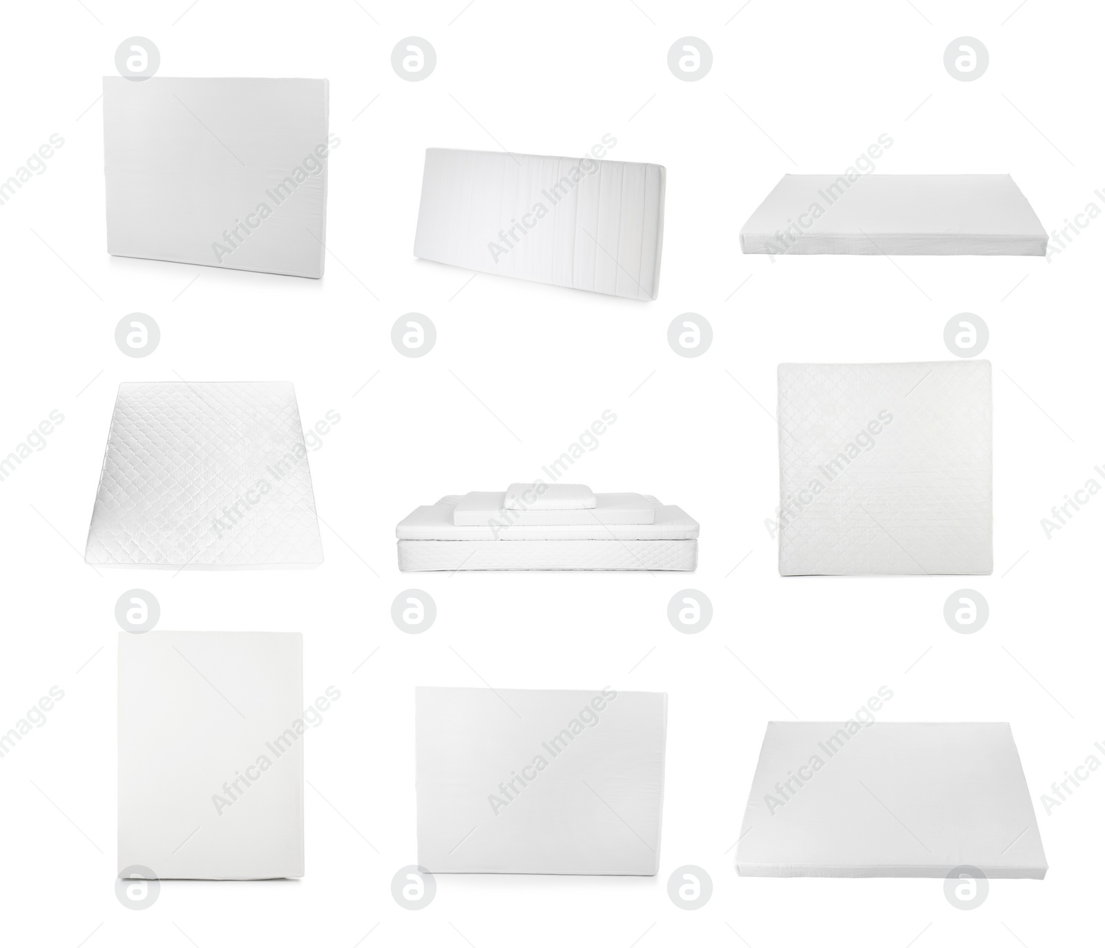 Image of Set with modern comfortable mattresses on white background 