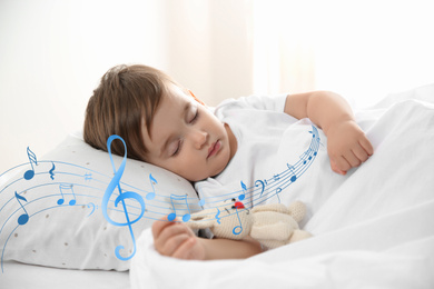 Image of Cute little baby sleeping with toy at home. Lullaby songs and music 