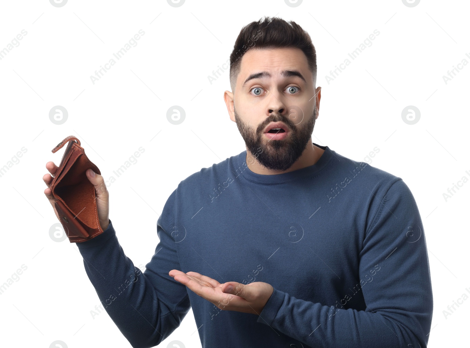 Photo of Confused man showing empty wallet on white background