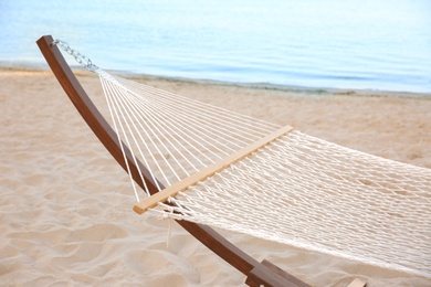 Photo of Empty hammock at seaside. Time to relax