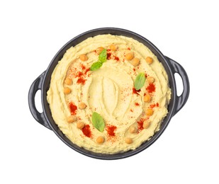 Delicious hummus with chickpeas and paprika isolated on white