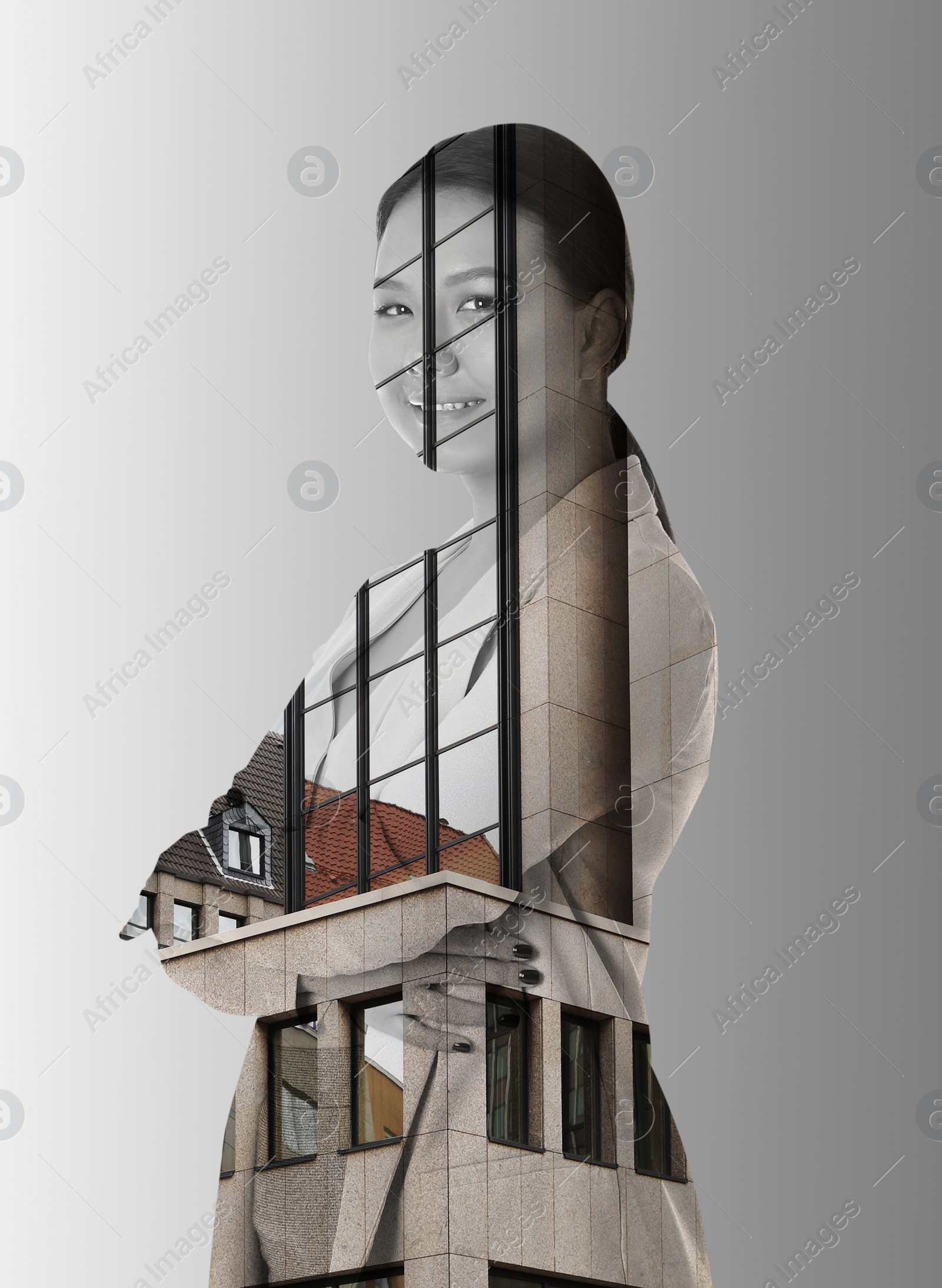 Image of Double exposure of businesswoman and office building