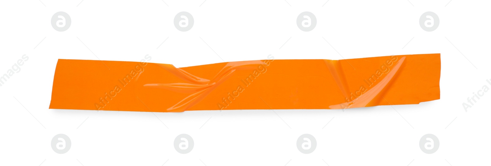 Photo of Piece of orange adhesive tape isolated on white, top view