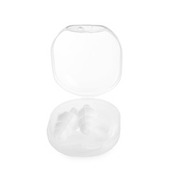 Transparent plastic case with ear plugs isolated on white